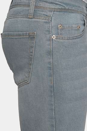 Light blue stonewash denim jeans close-up of button fly and front pocket