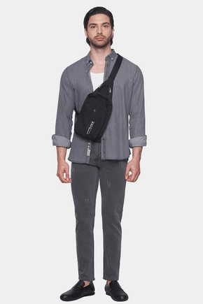 Gray denim shirt with front button placket and rolled sleeves