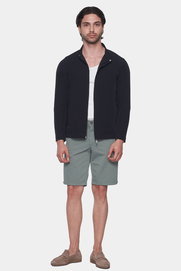 Seal green men’s shorts with button fly, belt loops, and side pockets