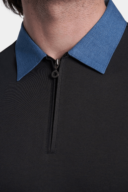 Charcoal polo close-up: blue collar with front zipper and placket