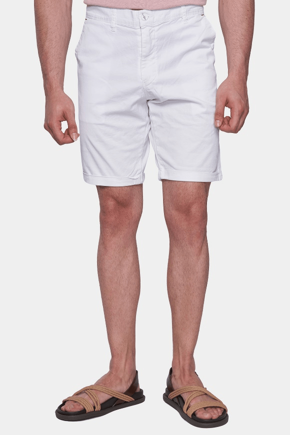 White casual shorts with button-and-zip fly and front pockets.