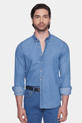 Light blue denim button-up shirt with button-down collar and roll-tab cuffs