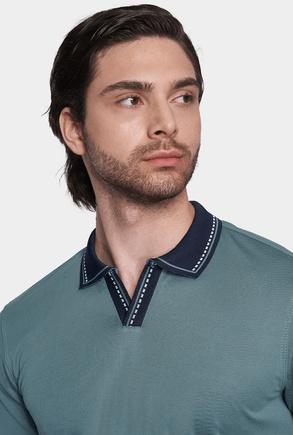 Racing green mercerized cotton open polo with navy contrast collar and dotted trim