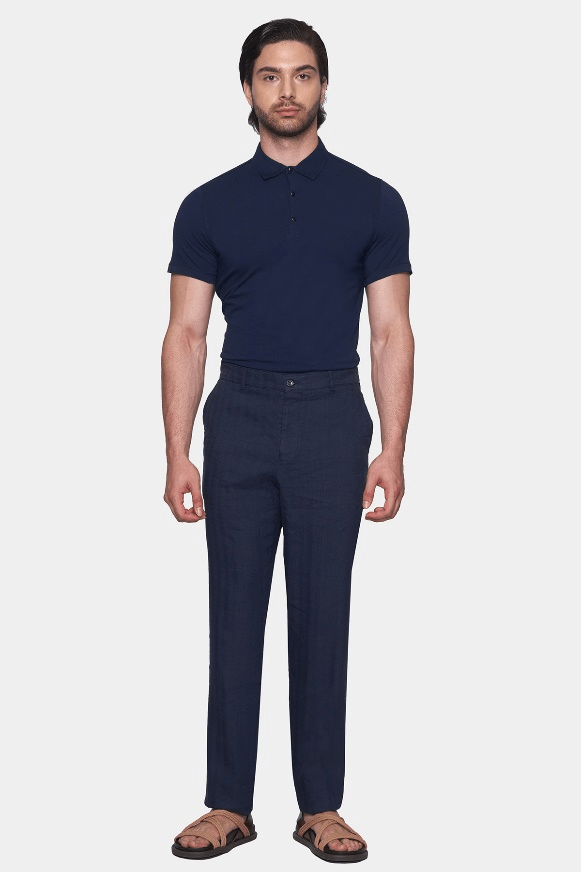 Men's dark navy chino pants with tapered legs and belt loops