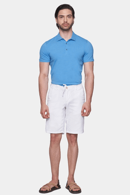 Blue mercerized cotton polo shirt on model, short sleeves and three-button placket