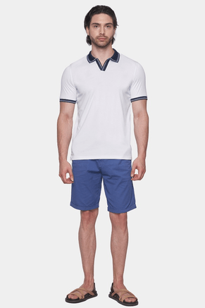 White polo shirt with open collar and navy trim, short sleeves