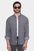 Gray denim button-up shirt with pointed collar and roll-up sleeves