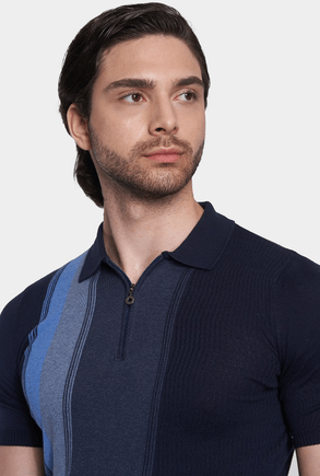 Men's dark blue cotton polo with ribbed texture and blue stripe panel, front close-up