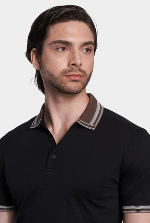 Black polo with brown striped collar and front button placket close-up