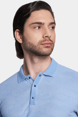 Men's sky blue knit polo shirt close-up with button placket
