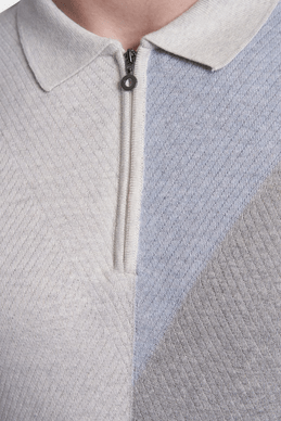 Half-zip placket and ribbed collar detail on blued gray mercerized cotton polo