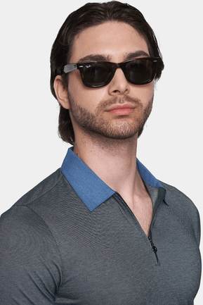 Stone dark gray polo close-up with blue contrast collar and button placket