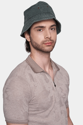 Cotton polo shirt with short sleeves and quarter-zip collar, pale beige, model portrait