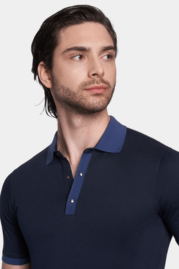 Dark blue mercerized cotton polo with contrast collar, short sleeves, buttons