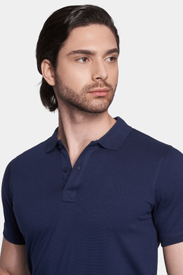 Deep sea blue polo shirt with pointed collar and button placket, close-up
