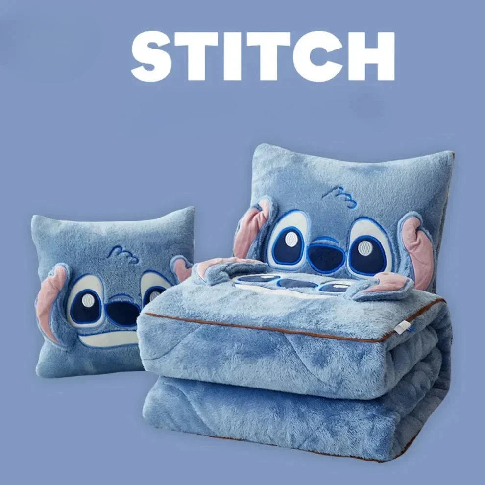 Folded blue plush blanket set with Stitch-style character pillow print