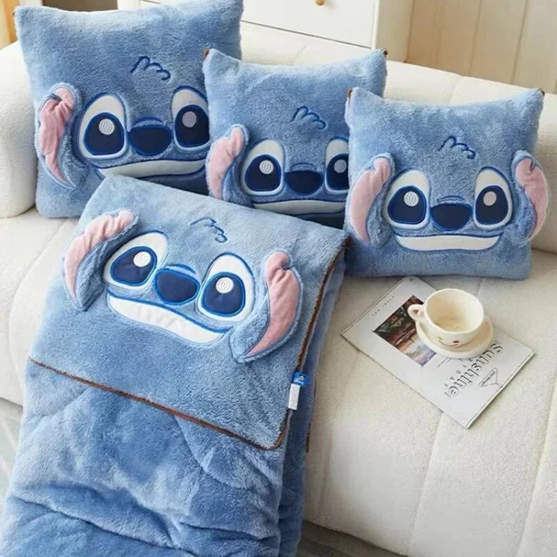 Blue plush blanket with Stitch-style character face and pillow-shaped design