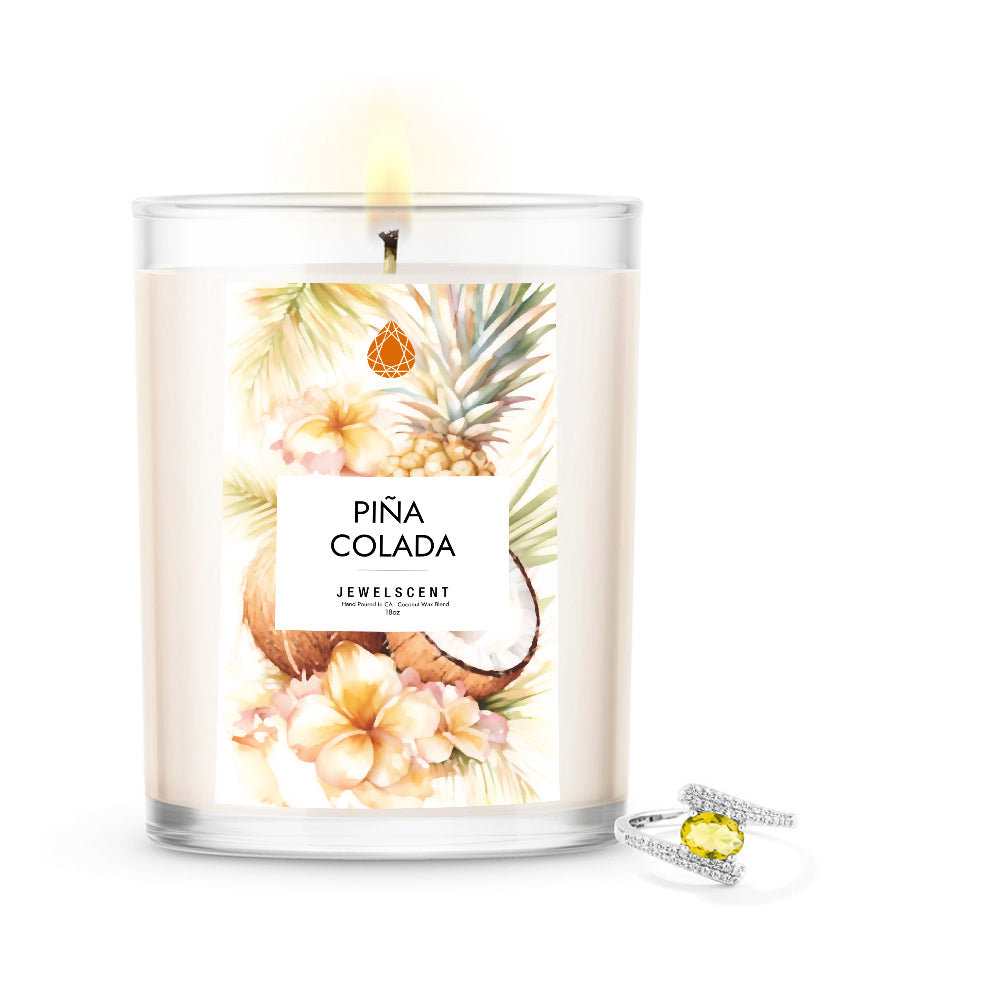 Mystery jewelry candle in glass jar with Pina Colada label and included ring jewelry