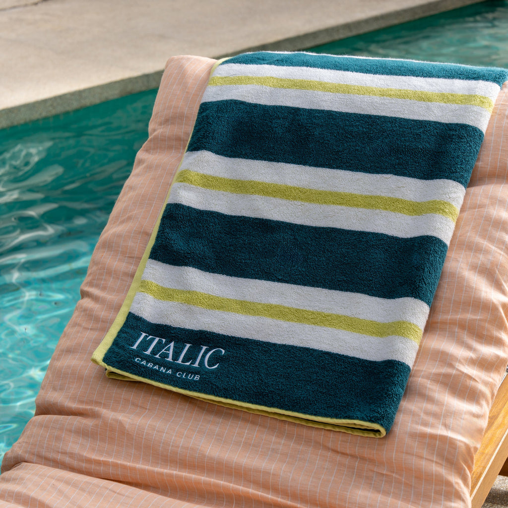 Navy and white striped cotton beach towel with green ITALIC label
