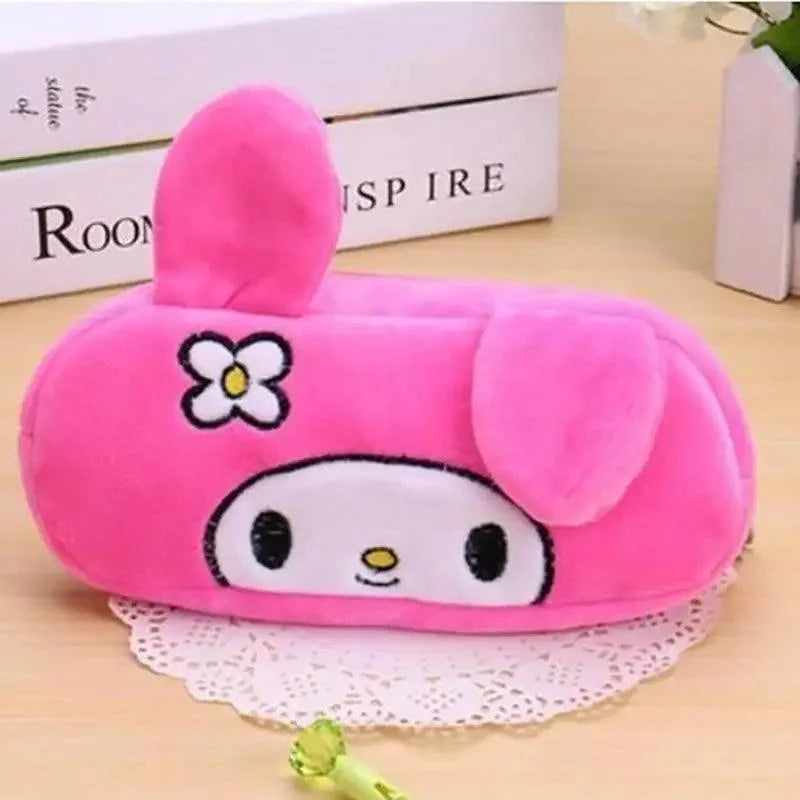 Pink plush animal pencil case with flower emblem, cartoon face, and zipper.