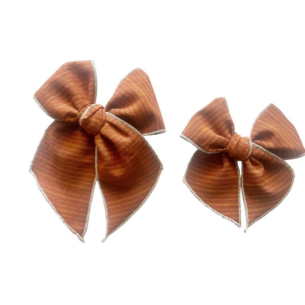 Brushed autumn striped fabric bow set in burnt orange with gold pinstripes