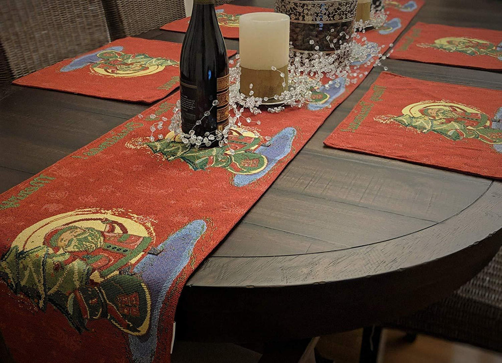 Red Christmas tapestry placemat runner with Santa artwork and green border trim