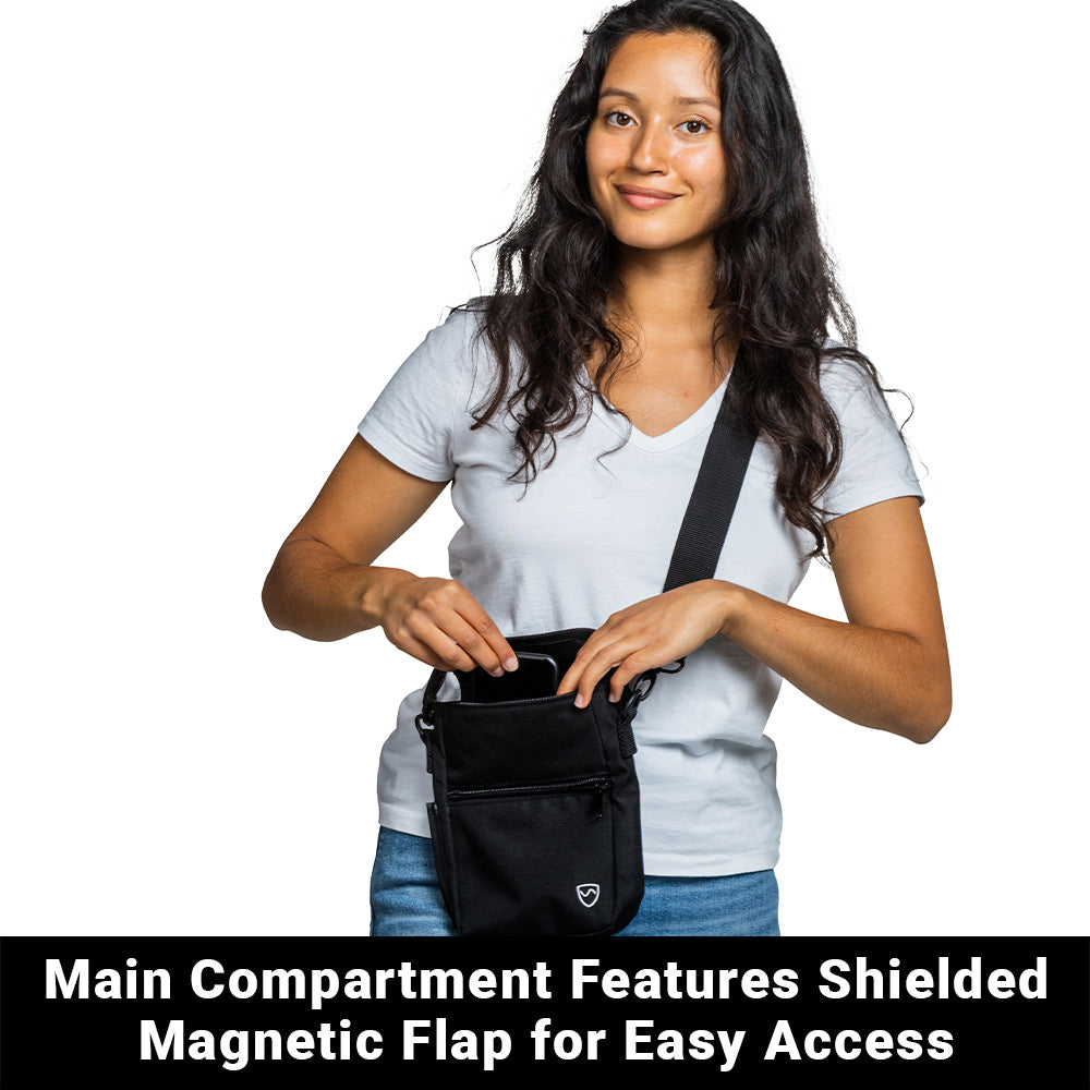 Black phone pouch with front flap and zipper pocket shown being worn on body