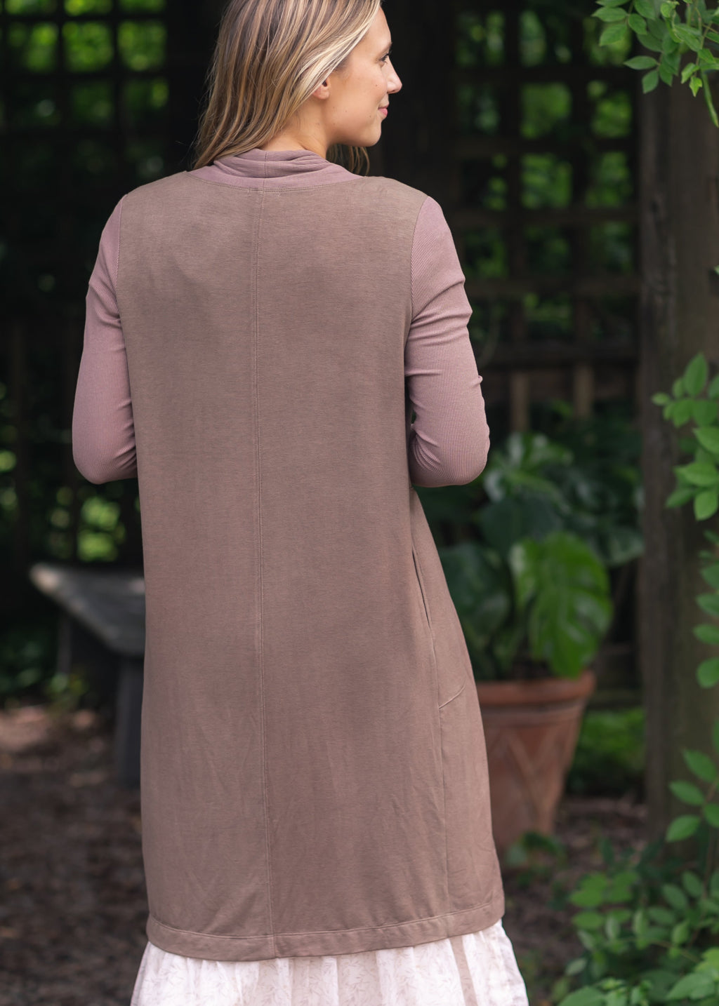 Back view open-front cardigan in taupe with long sleeves and side seam pocket