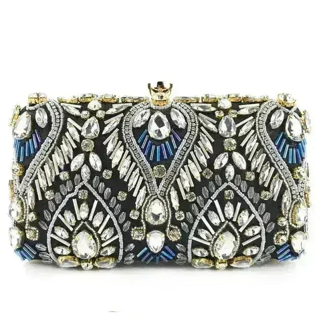 Black diamond rhinestone minaudiere with ornate silver gems and blue beaded details