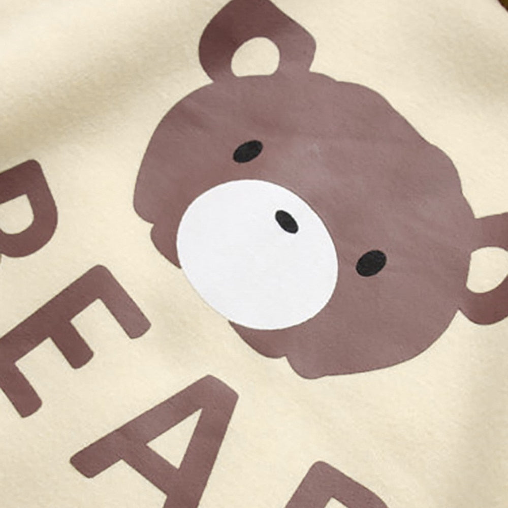 Bear face graphic on light yellow hoodie with 'BAR' lettering