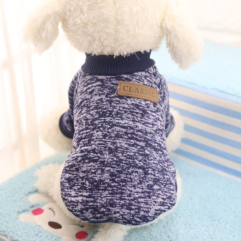 Navy winter pet sweater with ribbed collar and Classic logo patch.