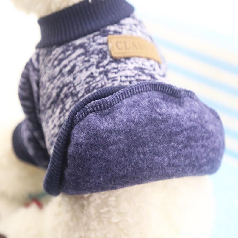 Dark heather pet sweater with ribbed turtleneck and large paw-shaped sleeve