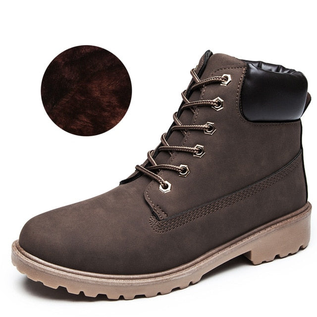 Dark gray plush ankle boots with black padded collar and lace-up front