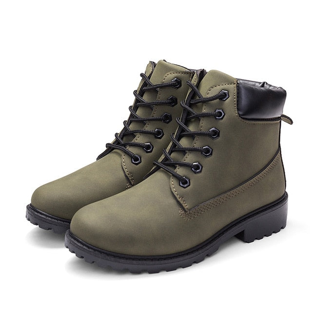 Olive plush ankle boots with black padded collar and lace-up front