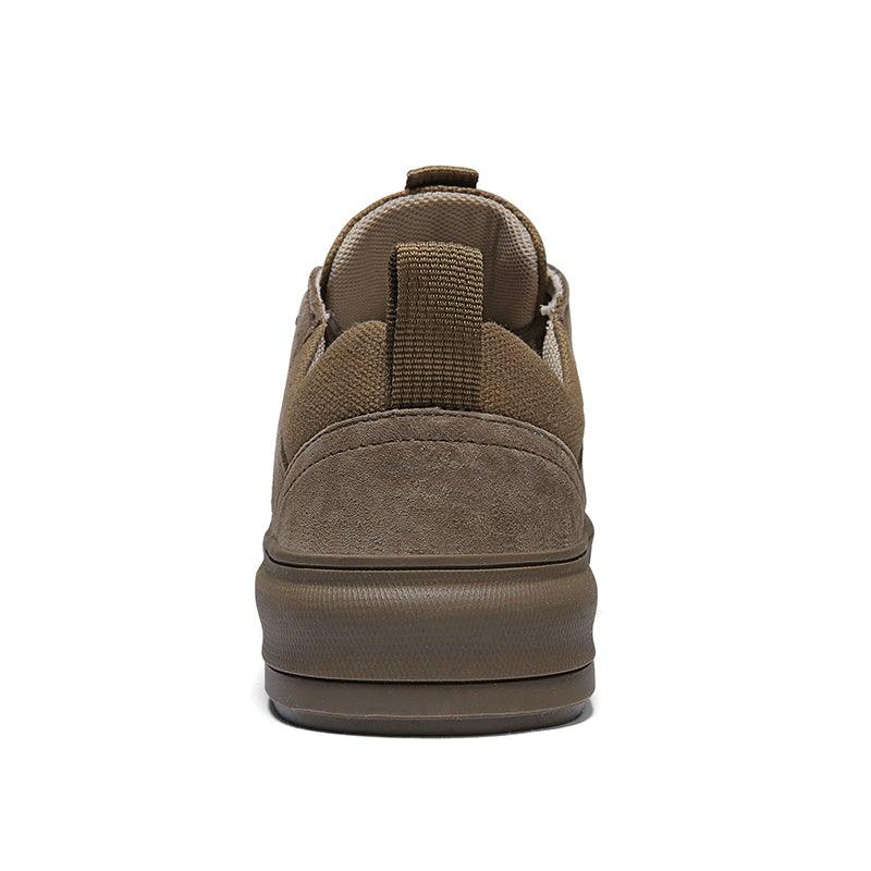 Back view of dark tan lace-up sneakers with padded heel and rubber sole