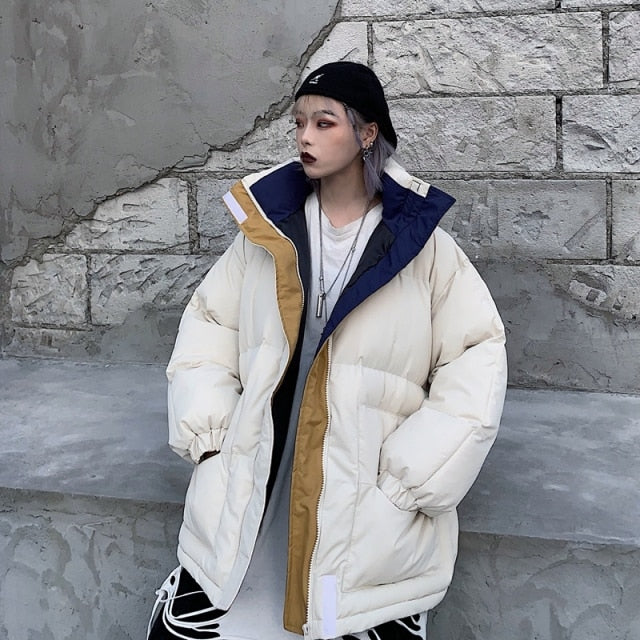 Women’s light beige quilted puffer jacket with contrast navy and mustard collar panels