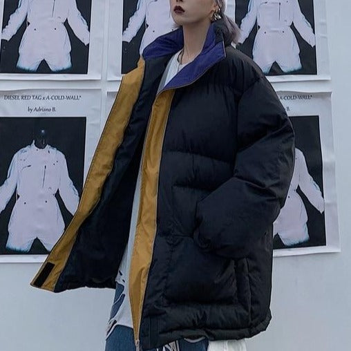 Black padded winter jacket with full zipper and contrasting tan inner panel