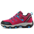 Low-top hiking shoes, bright magenta with teal-blue details and black rubber sole