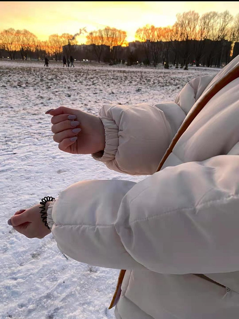 Off-white padded jacket sleeve with elastic cuff and zipper detail