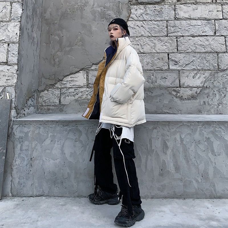Off-white padded winter jacket with full-zip front and stand collar