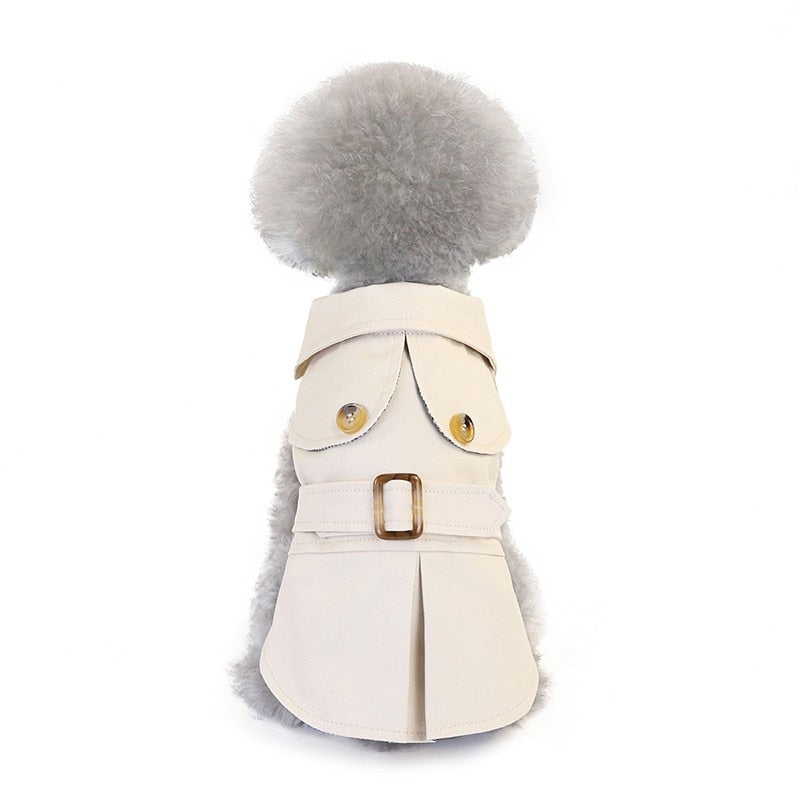 Beige pet jacket coat with rounded hood and front buckle belt on a dog