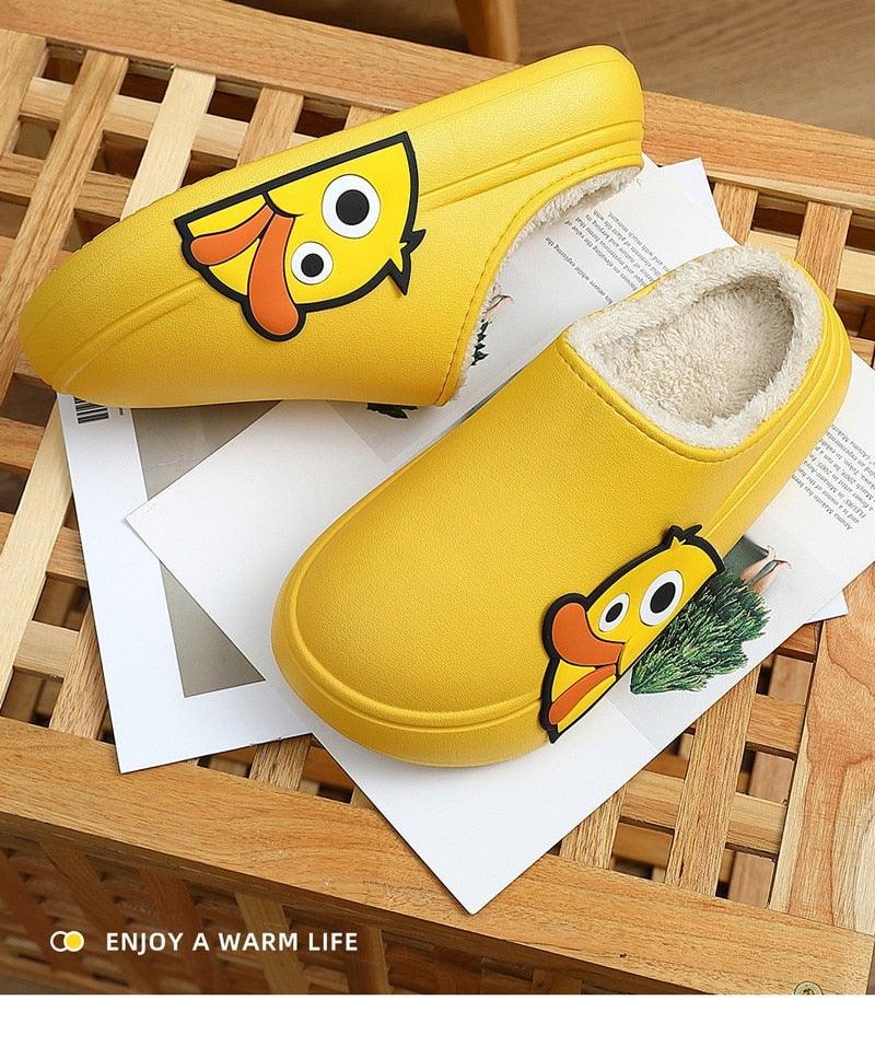 Yellow cartoon platform slides with sherpa-like lining, shown on a wooden tray.