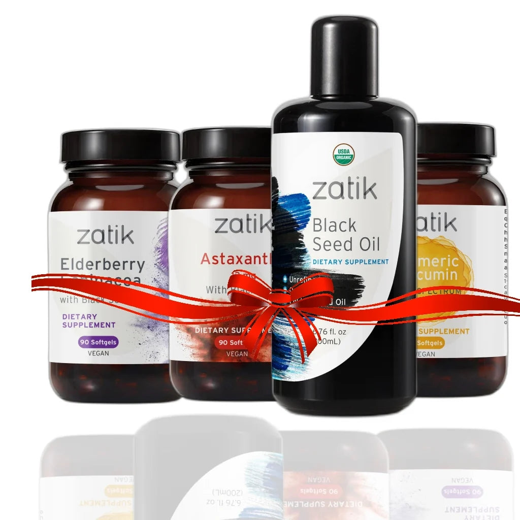 Natural wellness supplement package with Zatik amber bottles and black pump oil