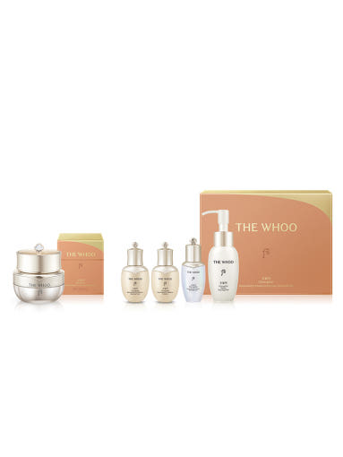 Eye cream gift set with cream jar, pump bottle, and mini serum bottles