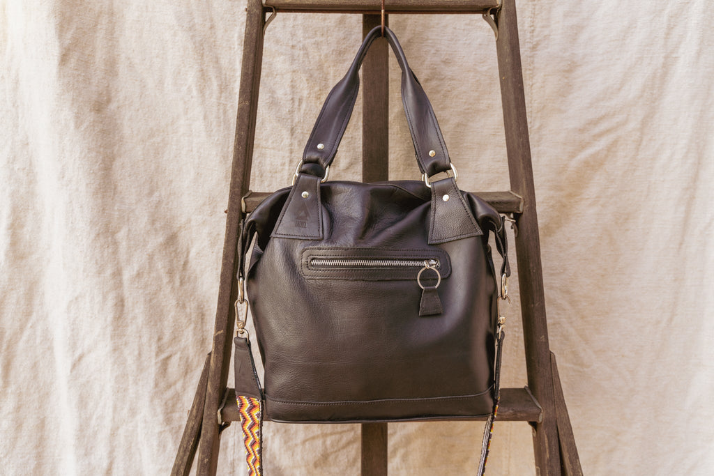 Black leather tote briefcase with top handles and front zipper pocket