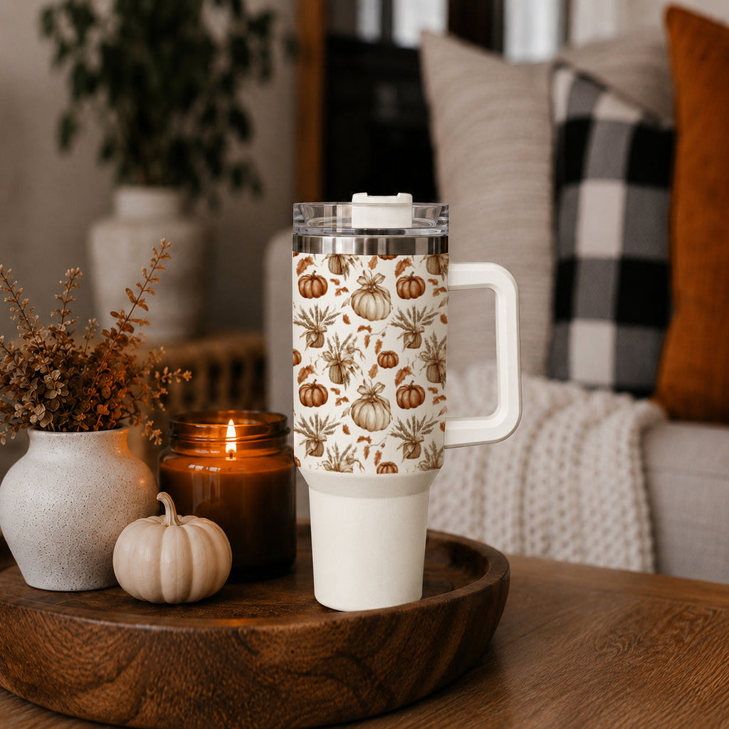 40 oz tumbler with pumpkin floral design, clear lid, straw, and white handle base