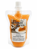 Squeezable wax melt pouch with amber wax and white screw cap, front view