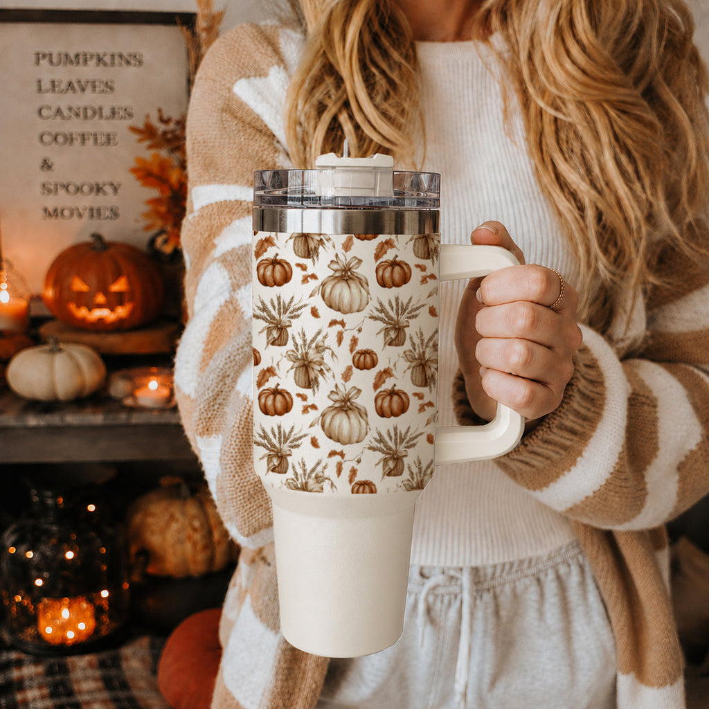 40 oz tumbler with autumn pumpkin pattern, clear lid, and straw drinking spout