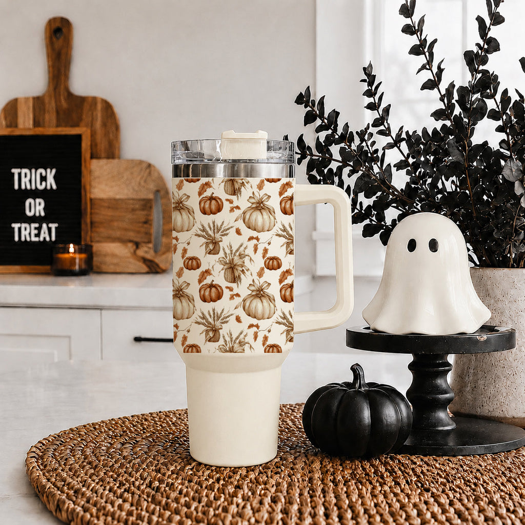 40 oz insulated tumbler with pumpkin print, clear lid, straw, and white handle