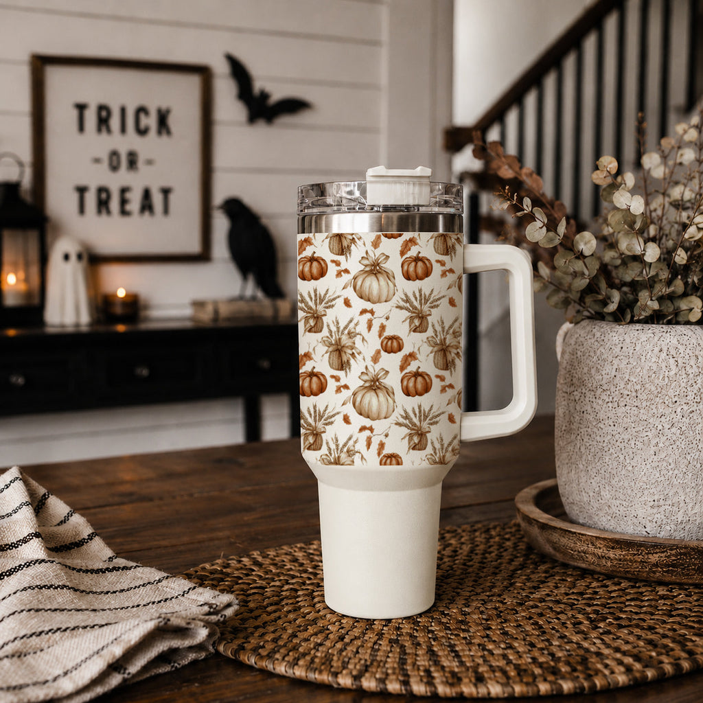 40 oz insulated tumbler featuring pumpkin and leaf pattern, clear lid and side handle